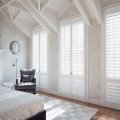 Living room with Norman Woodlore plantation shutters in an Arizona home