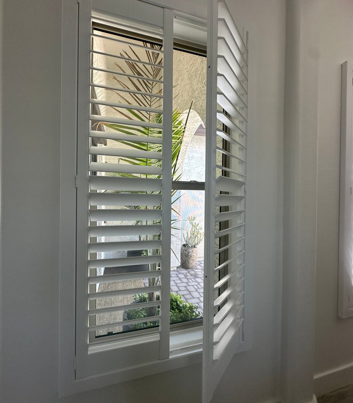 Shutter panel swung open on its hinge revealing a tight, gap-free closure