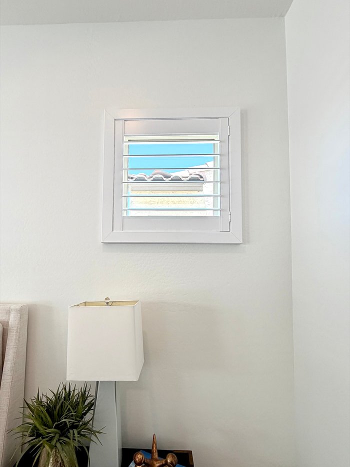 Small accent window fitted with a precisely measured Norman shutter, the custom measurement every Fountain Hills, AZ opening gets