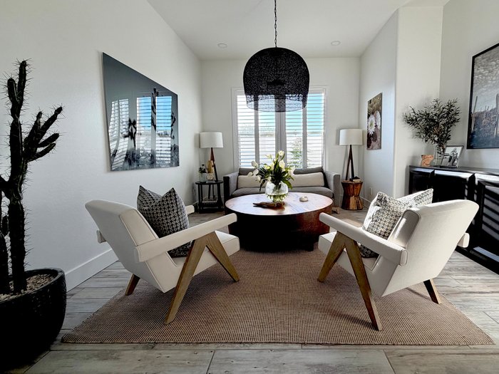 Great room framed by Norman Woodlore plantation shutters, the kind of west-facing glass we shutter in Scottsdale, AZ