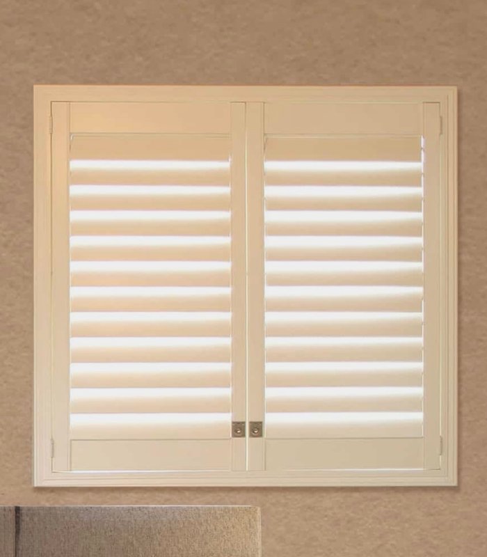 Two-panel Norman shutter in a cream finish with an L-frame