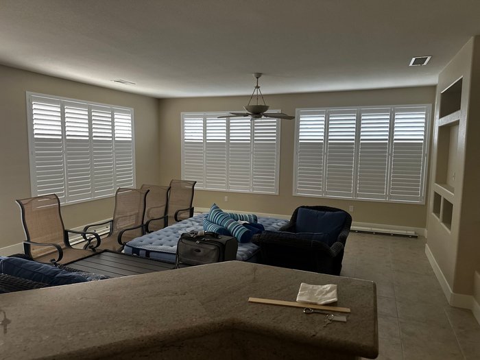 Whole-home install with Norman shutters on every window of an Arizona room, where the value shows up for Phoenix, AZ homeowners