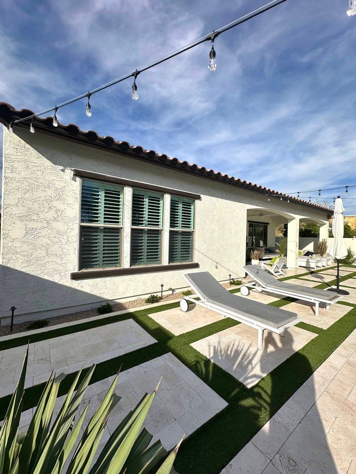 Exterior of an Arizona home with plantation shutters visible through the windows, Phoenix, AZ