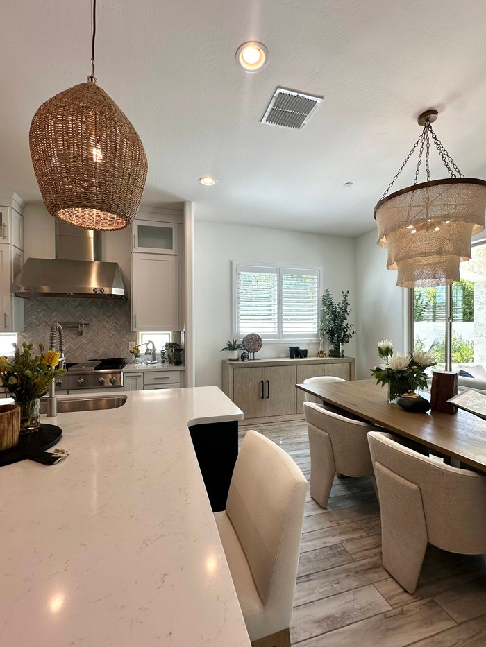 Norman shutters on kitchen and breakfast nook windows, one product carried through a Gilbert, AZ house