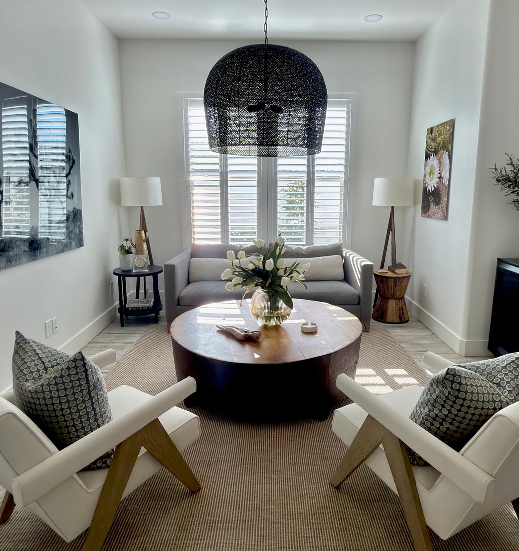 Living room with Norman Woodlore plantation shutters in a Phoenix metro home