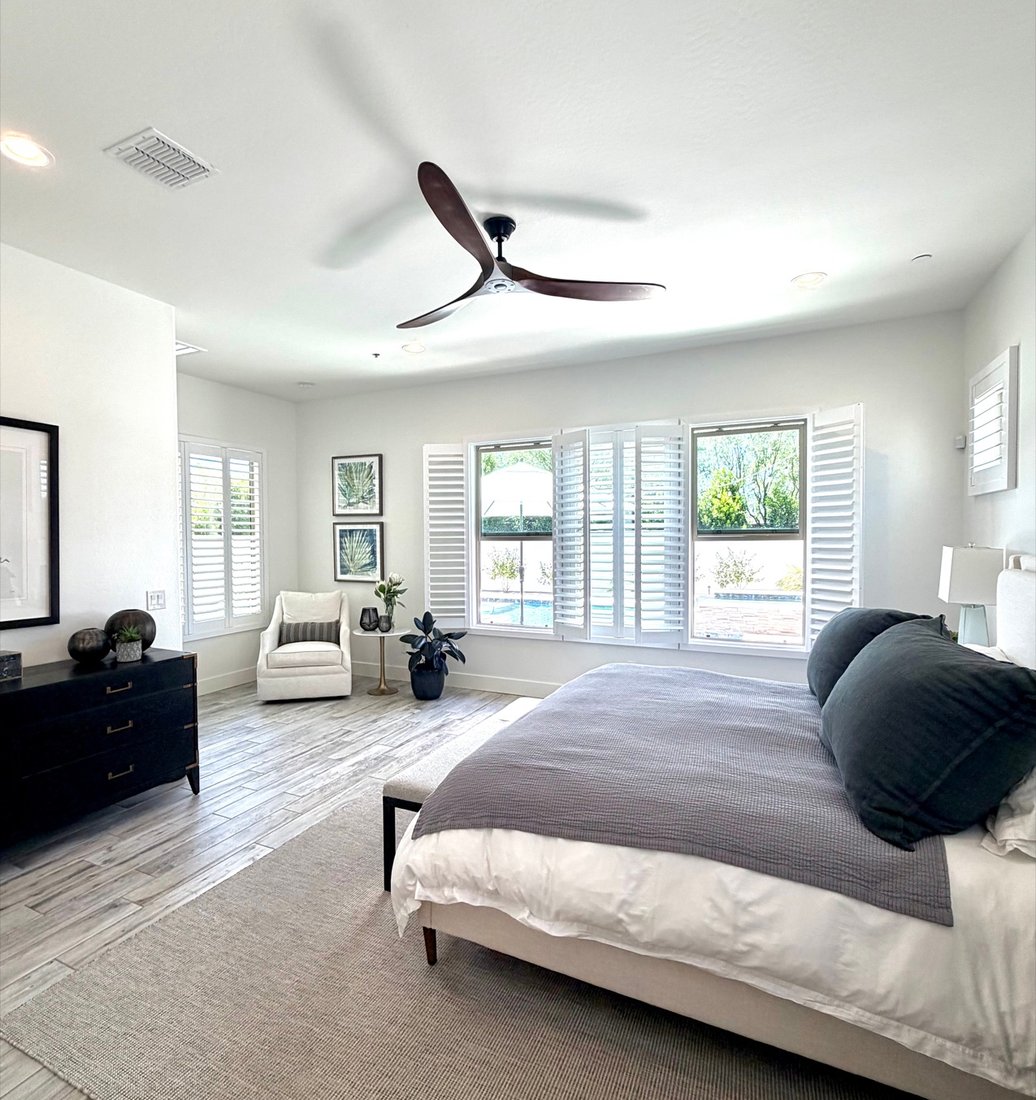 Norman Woodlore plantation shutters in a Chandler, AZ bedroom